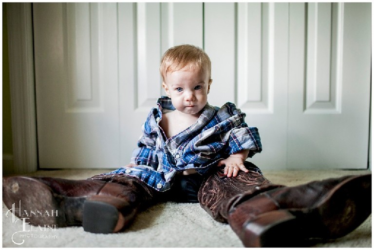 baby wears his daddy's cowboy boots