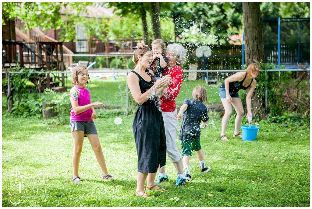 family water balloon fight in the back yard