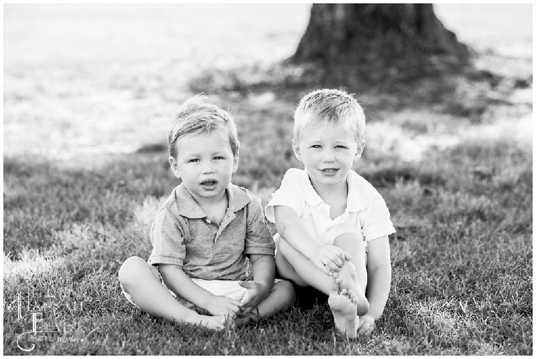 black and white photo of two little boys looking like a gap ad