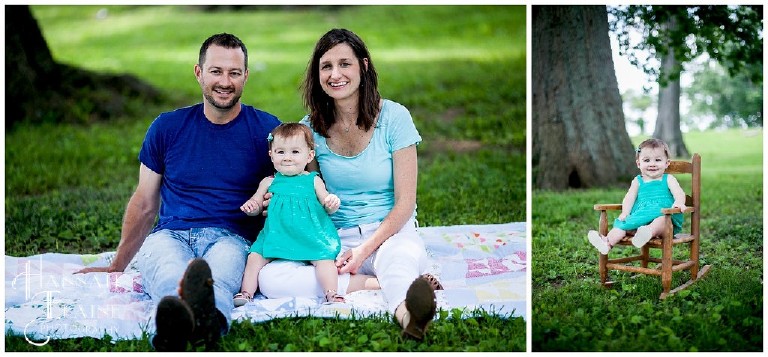 family sits on a blanket in the park for portraits