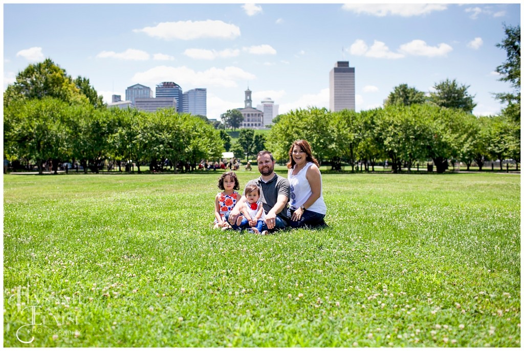 family photos at bicentennial mall with the nashville skyline in the background