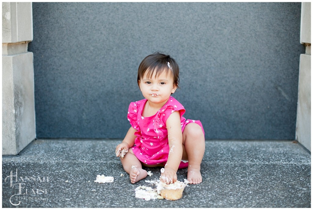 one year old cake smash with pink dress