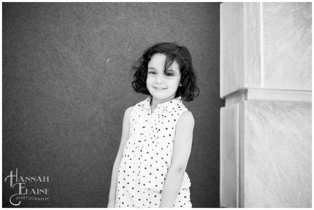 black and white image of little girl at the ampitheater