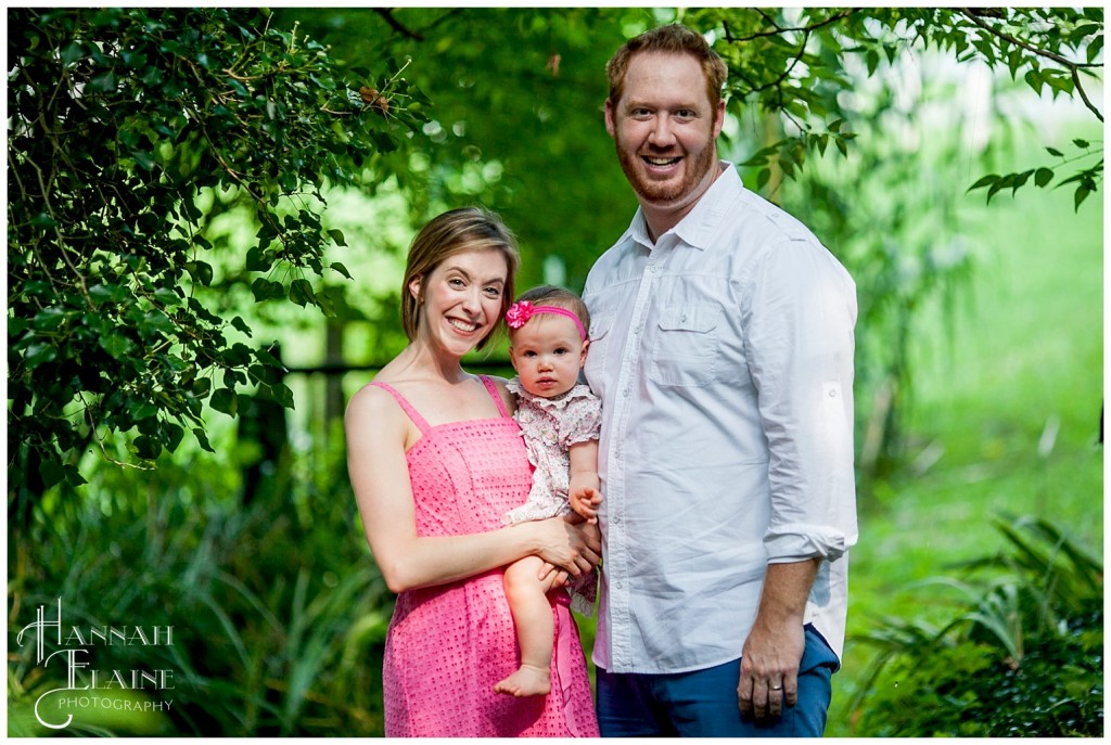 family of three get their portrait taken