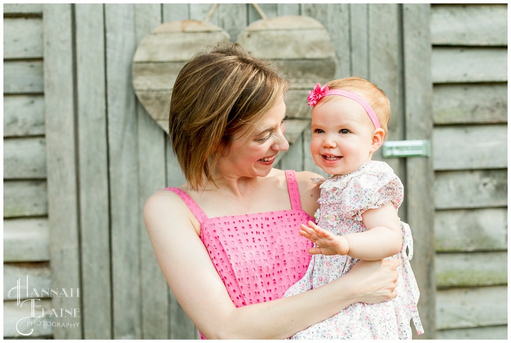 mom and daughter laugh together