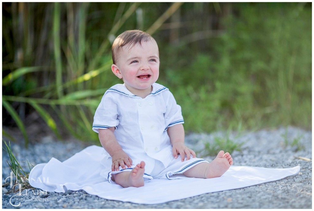 boy in sailor jumper on the coast