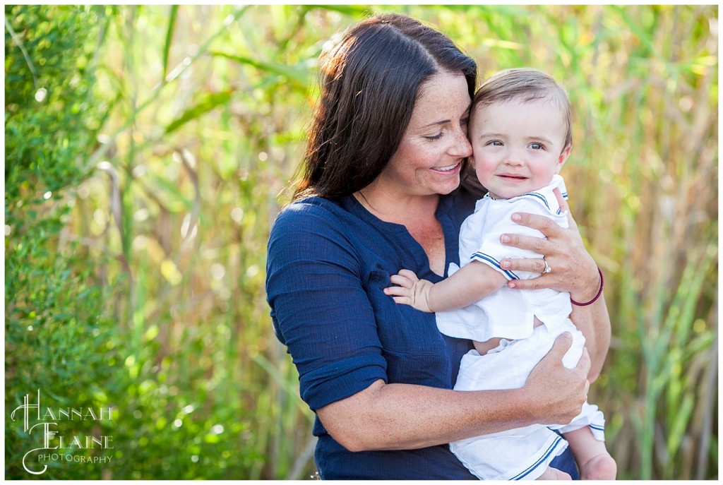 baby charleston and mom in front of the coastal grass