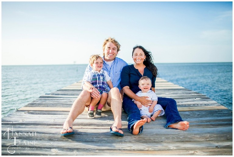 family of 4 on the dockside at mobile bay