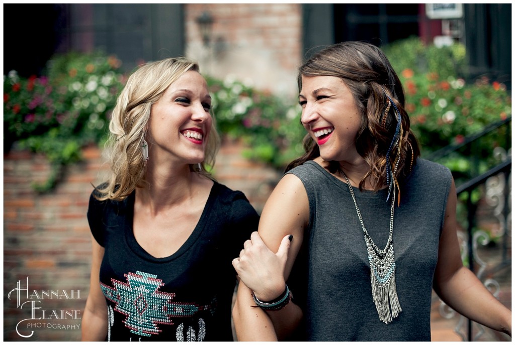 hayley and sara laugh together in printer's alley