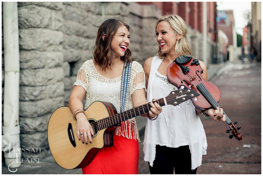 steel blossoms pose with their instruments in the ryman alley