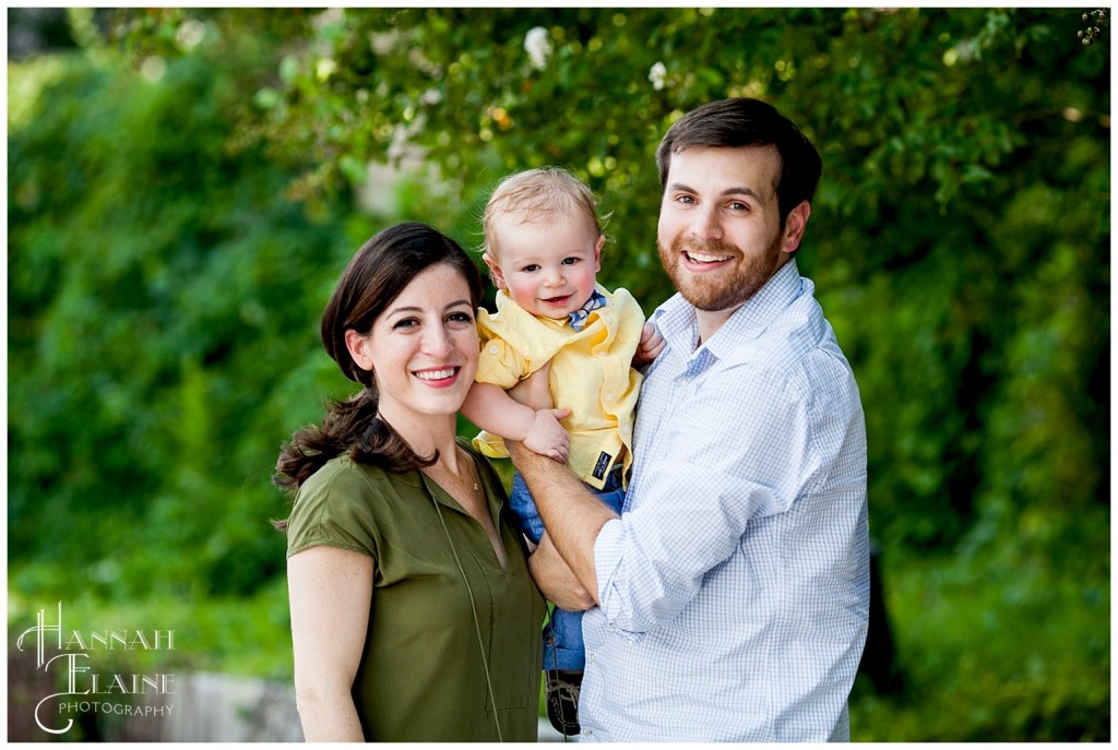 family poses together on a hot august afternoon