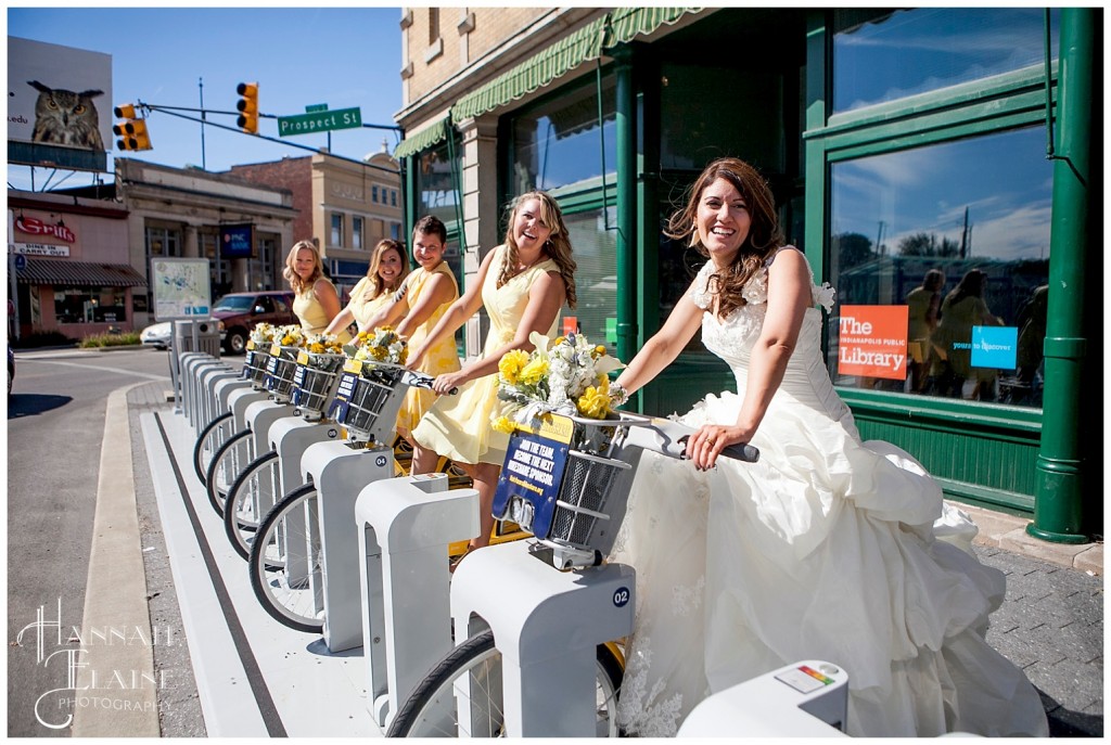 girls in yellow dresses on yellow bikes