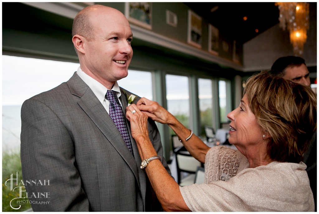 pinning the boutonnieres 