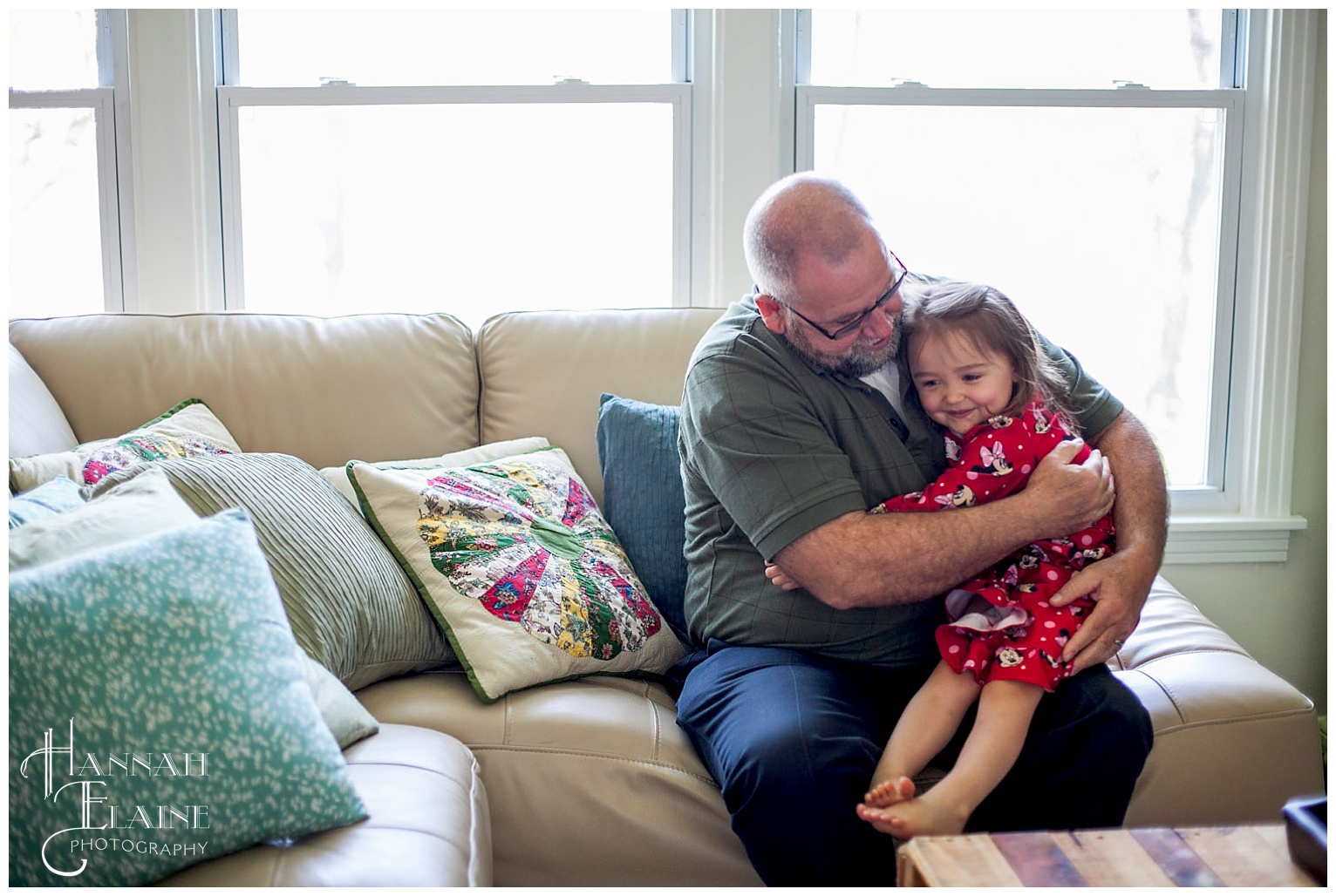 grandpa hugs granddaughter