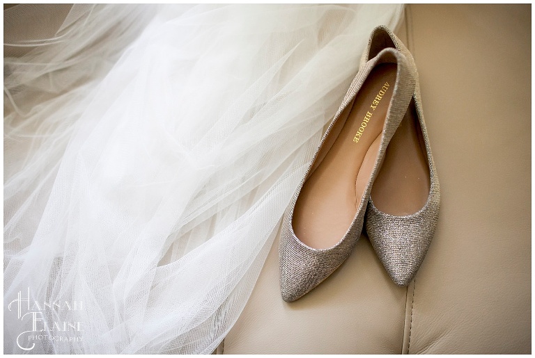 sparkly flats for wedding shoes next to veil