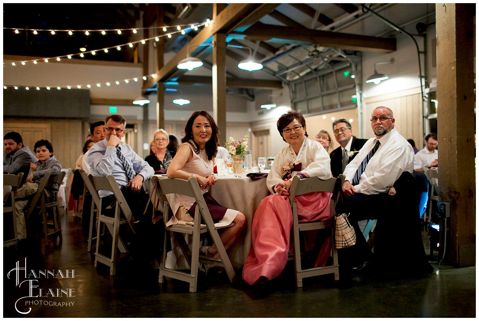 bride's family watches the speech with smiles