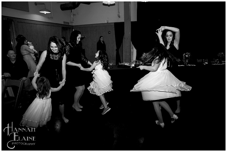 nieces of the bride twirl in their flower girl dresses