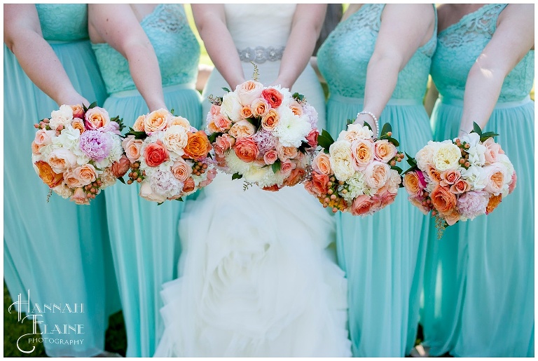 teal bridesmaid dresses with orange and peach flowers
