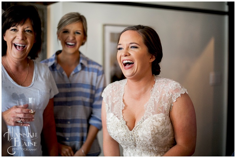bride laughing with her girls