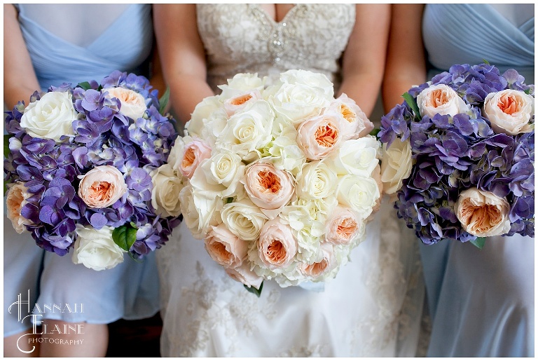 close up of purple and white and peach bouquet