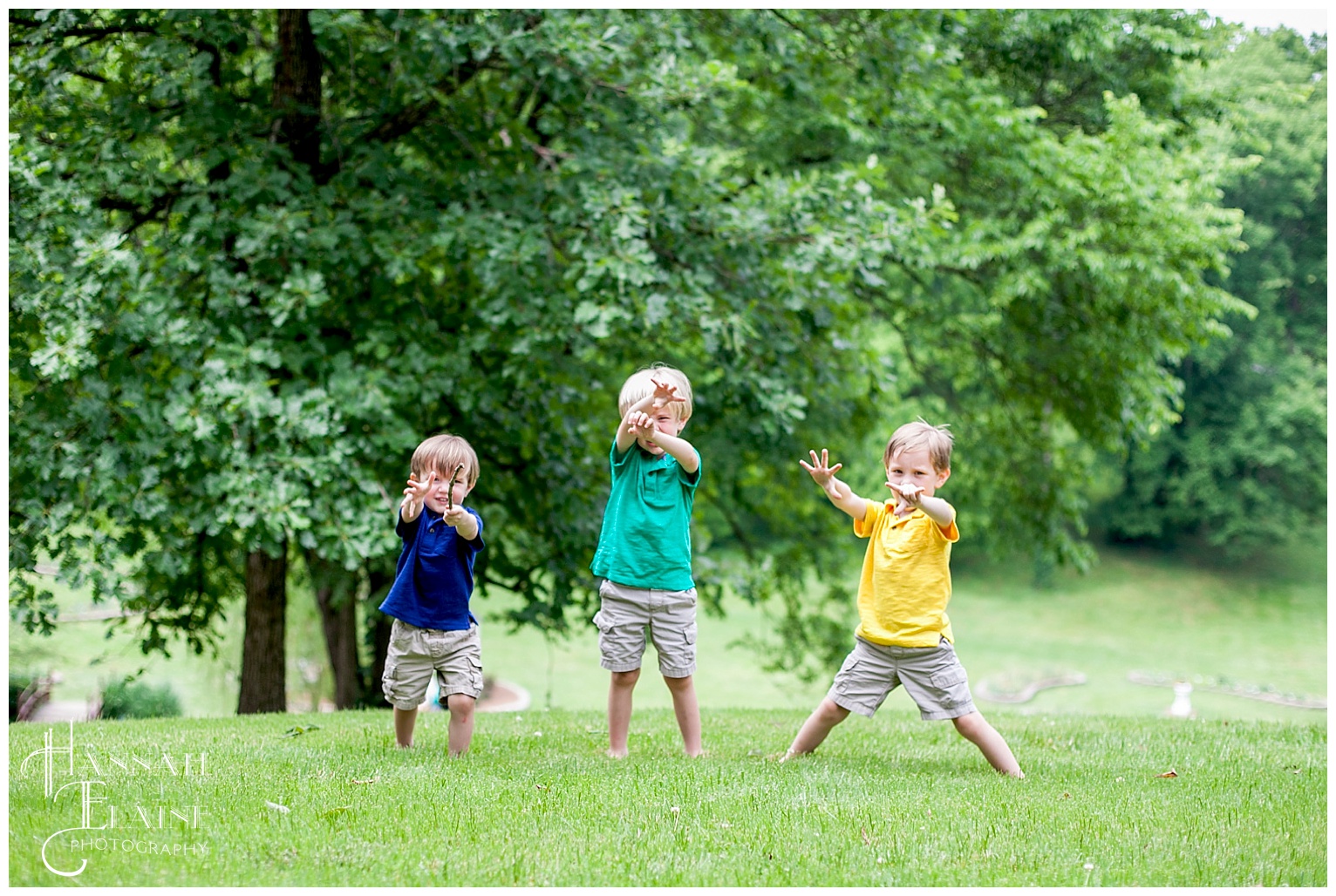 3 boys do their best super hero pose