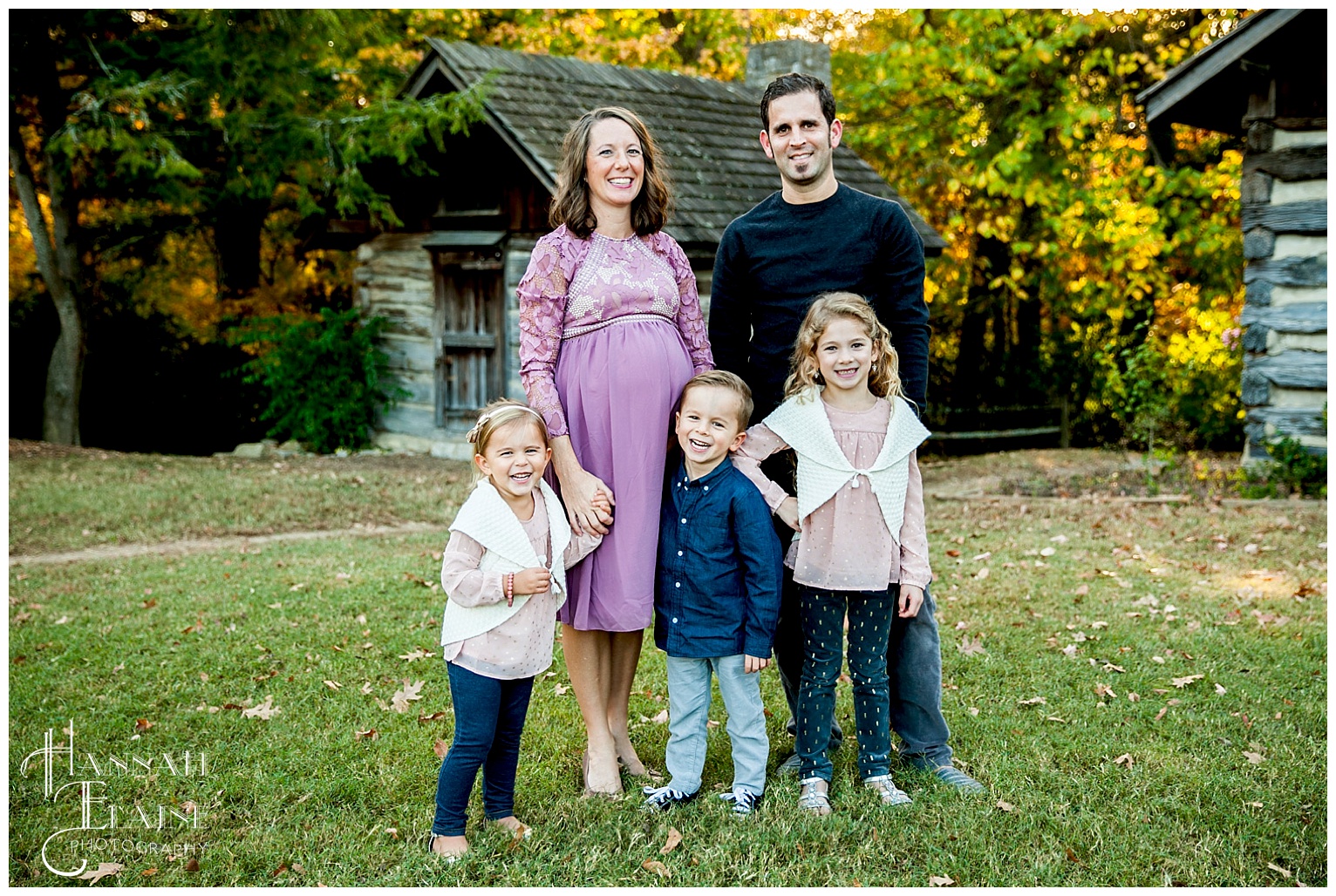 family photos in front of the cabins at ellington agricultural center