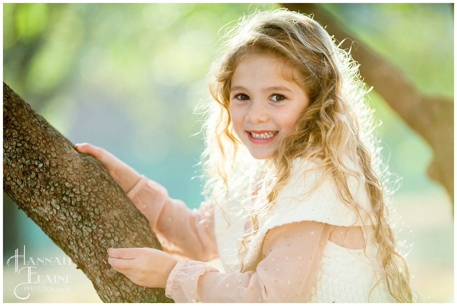 sweet girl climbs a tree in the park at ellington agricultural center